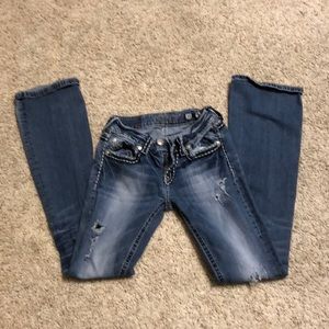 Boot cut Miss me ripped blue jeans